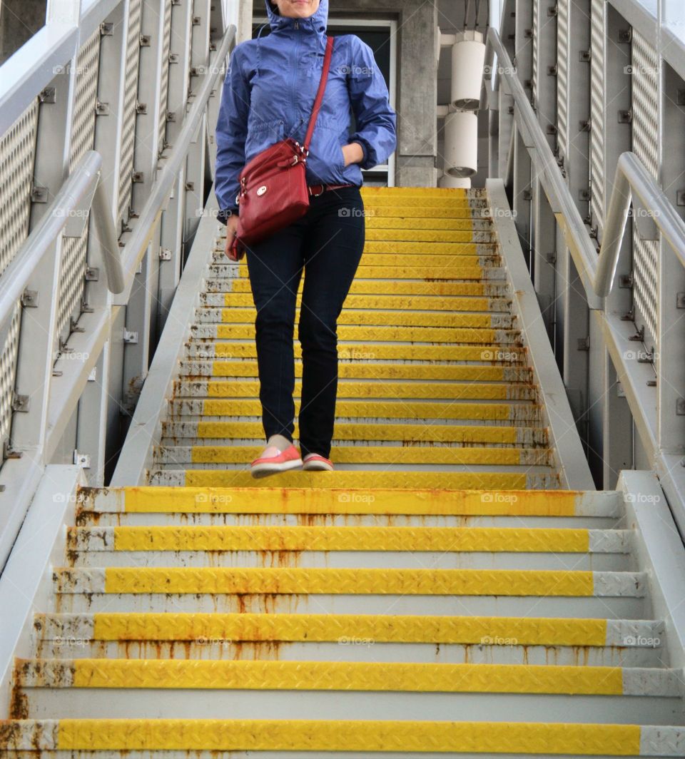 Girl walking down the stairs 