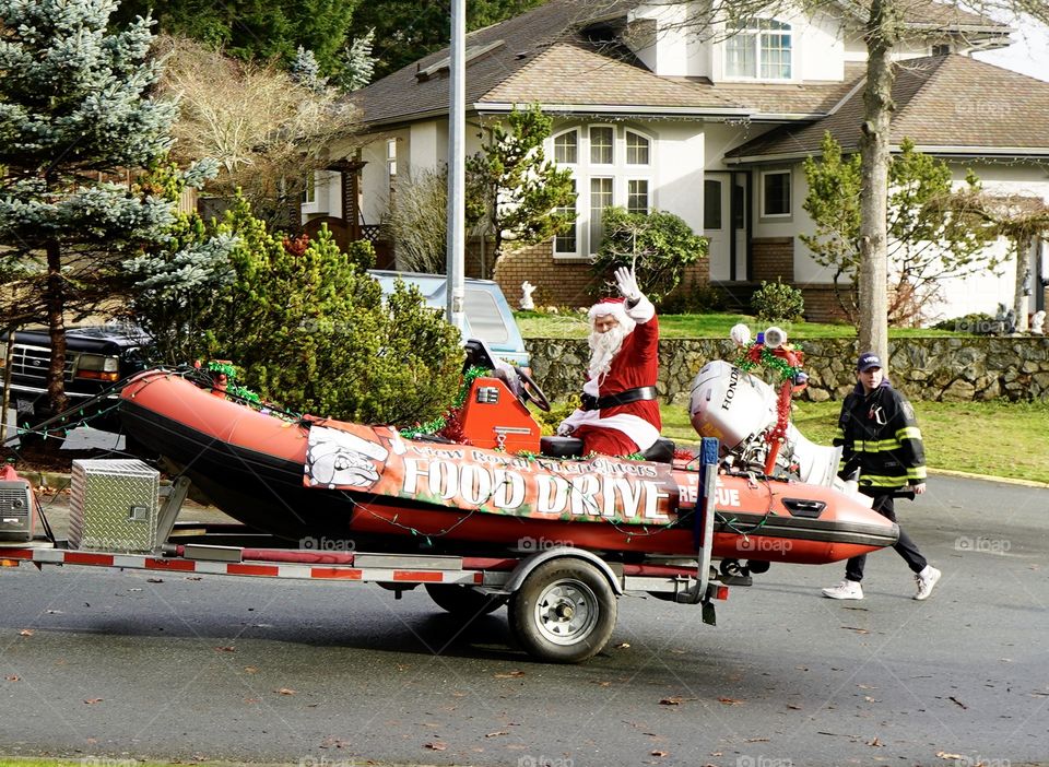 Santa on a rescue boat - food drive 