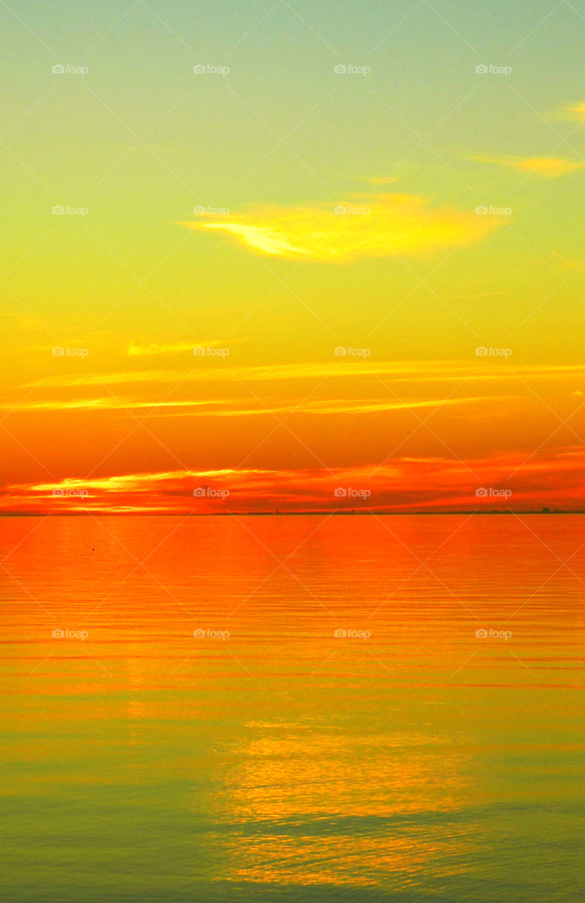 Incredible Sunsets! I am a Sunset enthusiast! The brilliant crimson, amber,tangerine, and blue hues of the sunsets sweep the sky and the surface of the waterways as the beautiful colors embrace the heavenly sky! Breathtaking!