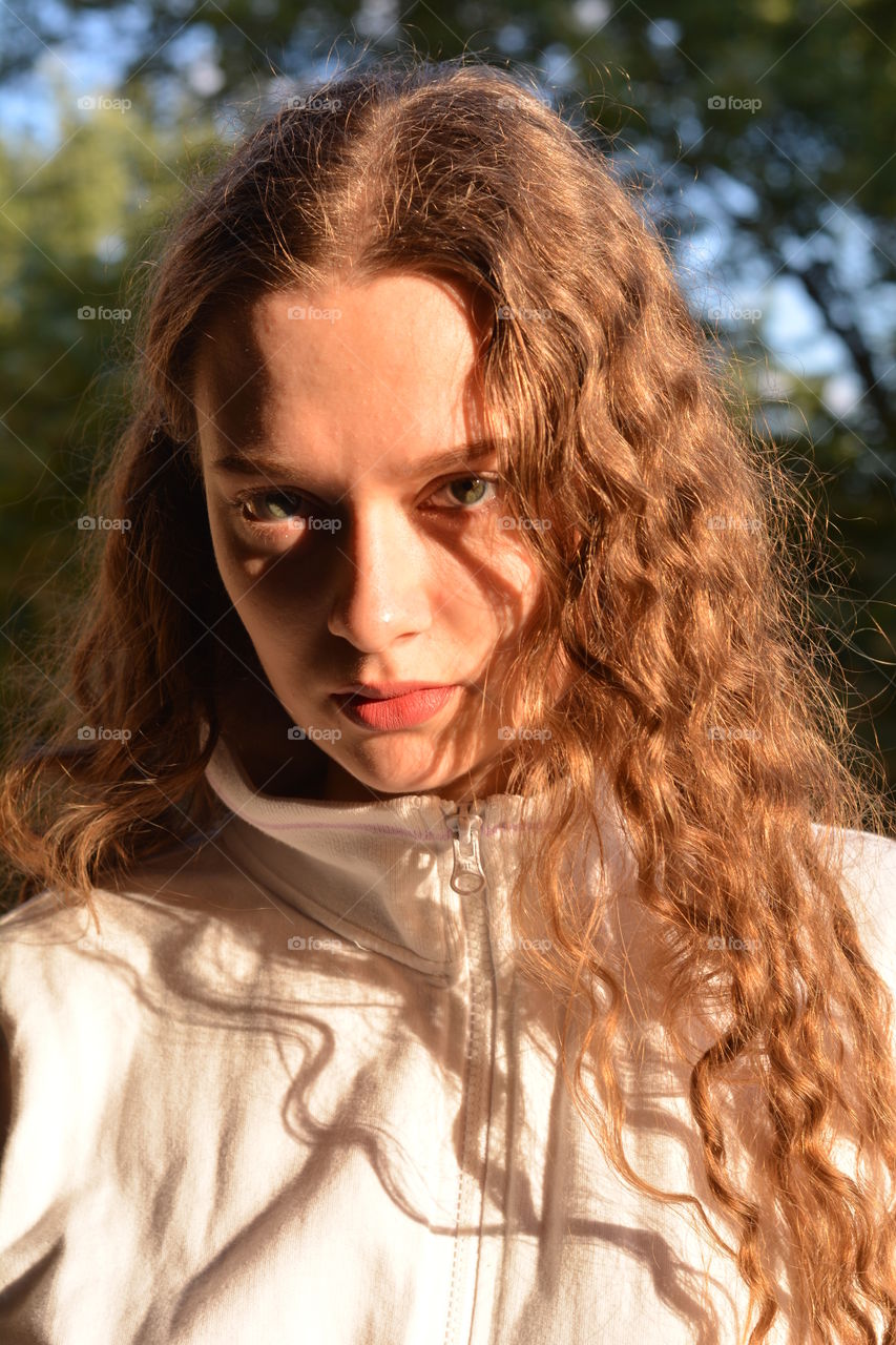 girl beautiful portrait close up in the sunlight