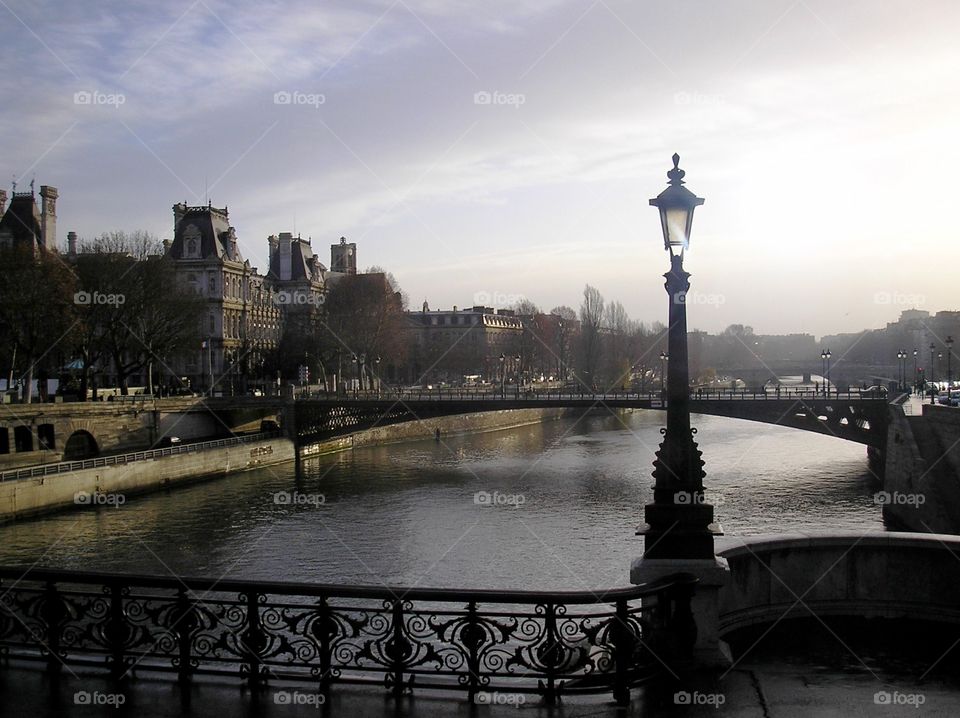 Morning sunshine On the bridge in Paris