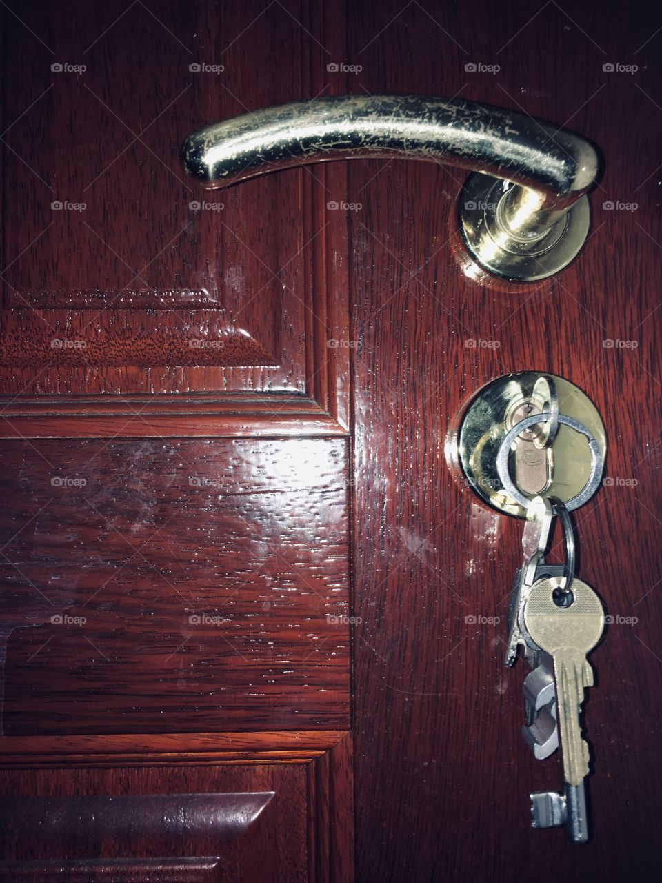 Keys of metal in the door lock