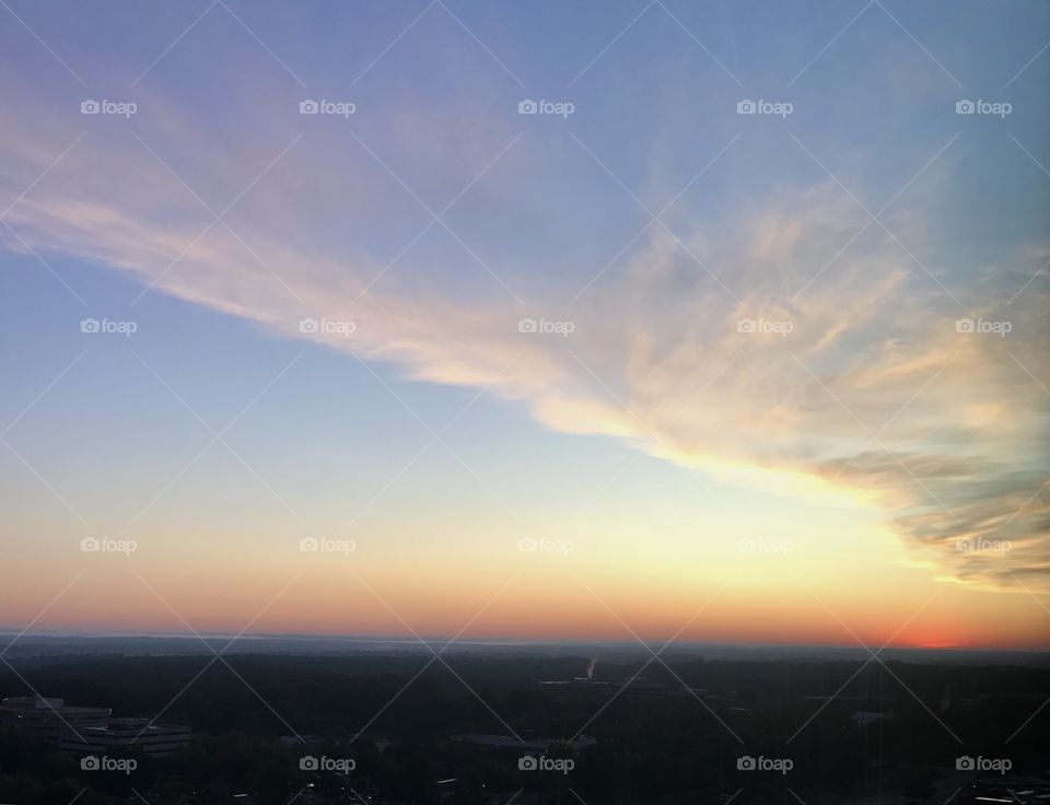 Sunrise and angle wing clouds 