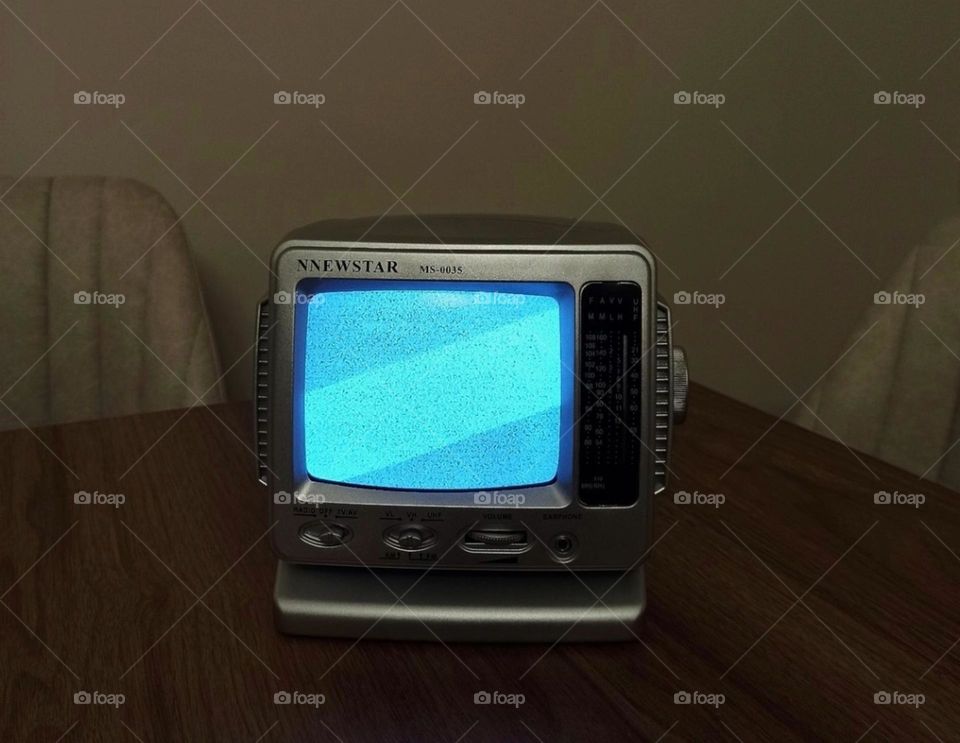 The static on the screen whispers stories of untold broadcasts, lost signals and forgotten memories