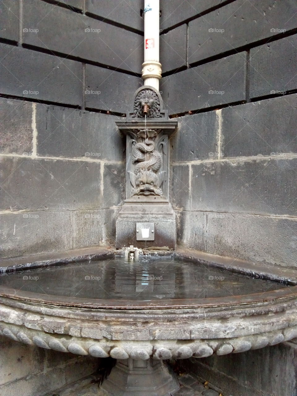 One of many small fountains downtown in Clermont-Ferrand, Auvergne, France