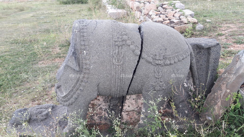 cut elephant metal stone