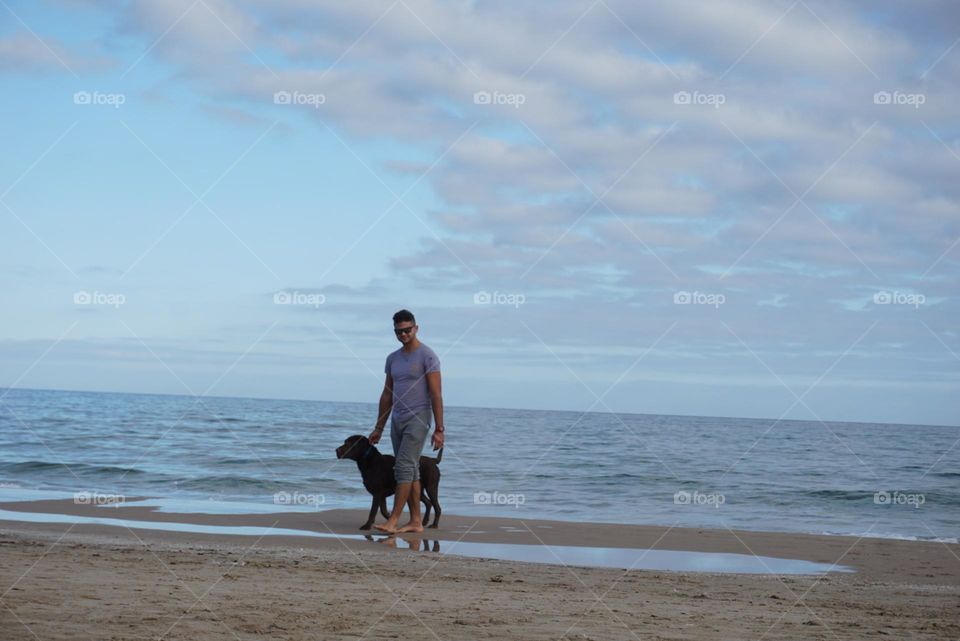 Beach#sea#human#dog