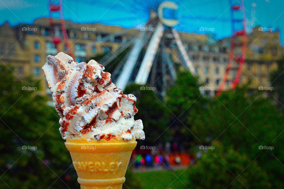 Hands holding ice cream 