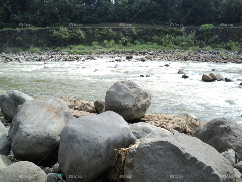 photos of river water flow with rocks