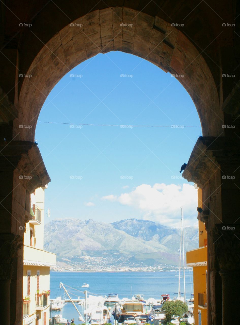 View from below huge stone arch.