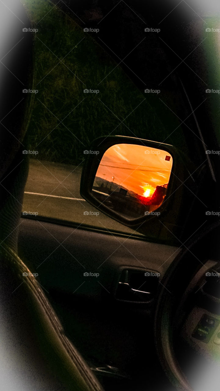 sunset in the side mirror