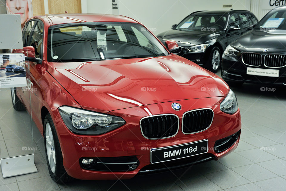 Red BMW in a carshop.