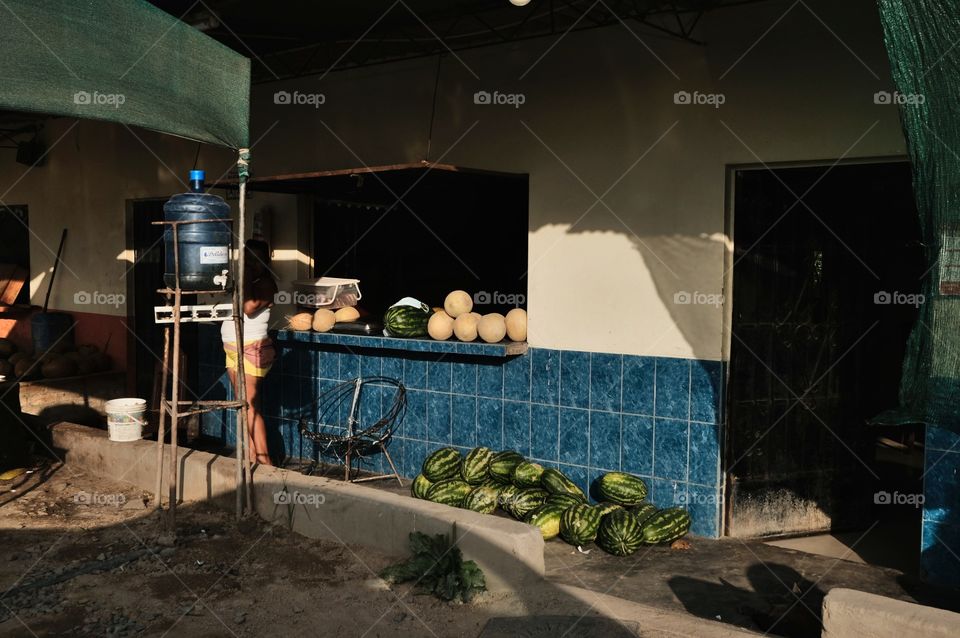 Sale of fruit, watermelon, melon and coconuts on the roadside