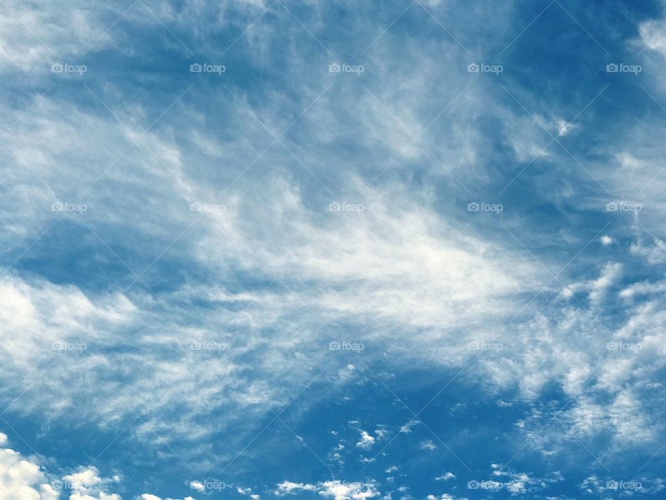 Blue sky and Lacey clouds 