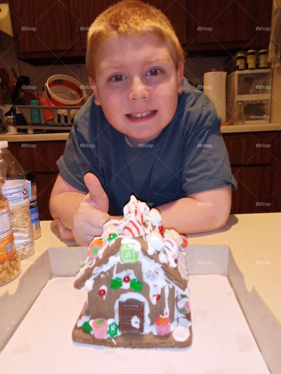 ginger bread cook -house and boy