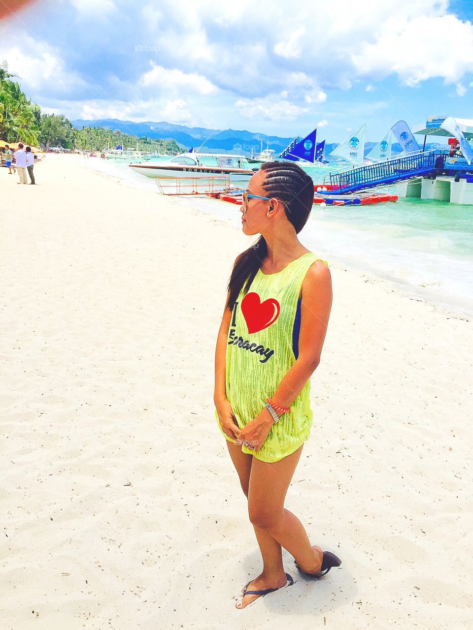 Summer. A woman at the beach 