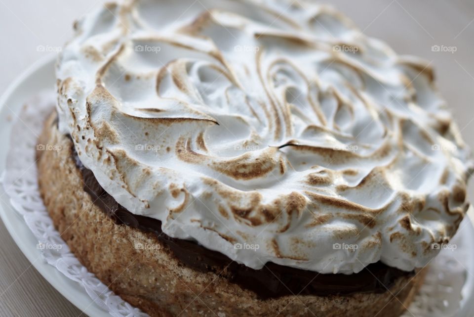 Homemade chocolate nuts and meringue cake