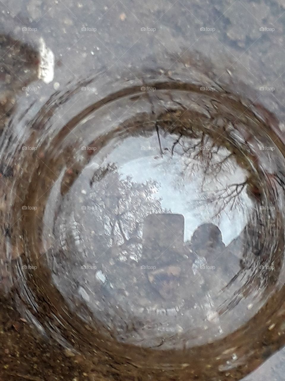 Rain water on the ground, reflection of rain water bubble
