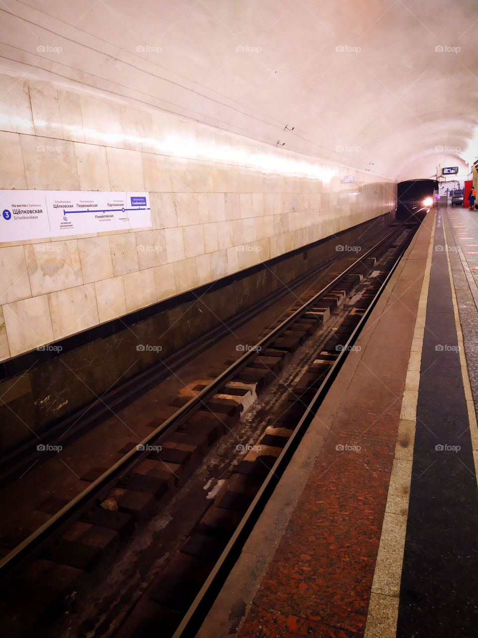 Lights of a train leaving a tunnel in the Moscow metro