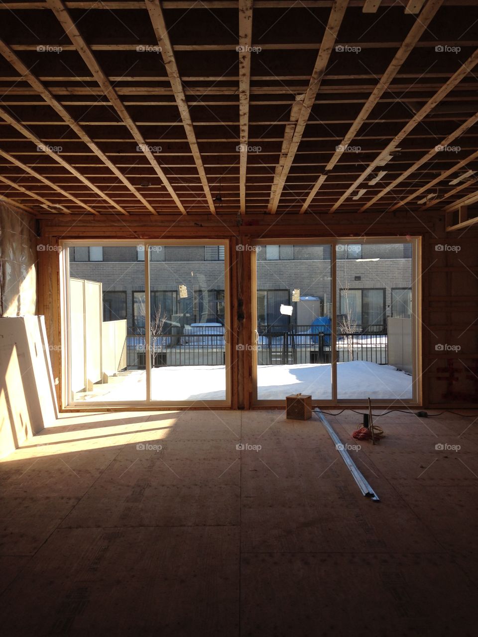 Construction, an unfinished house and windows