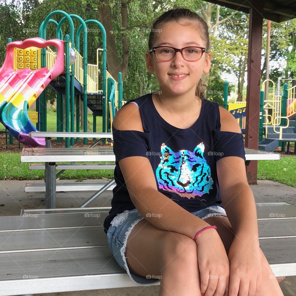 Little girl by play ground