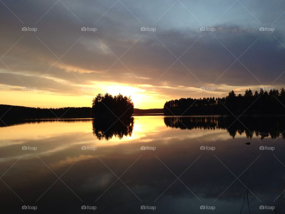 Sunset over the lake Halsjön on Dalarna, Sweden.
