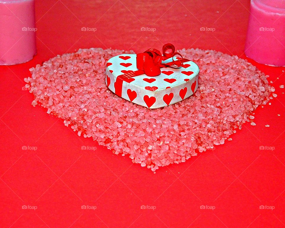 The best known, universal symbol of love is the heart-shaped ideograph, and it symbolizes the core of romantic love, affectionate emotion and caring.