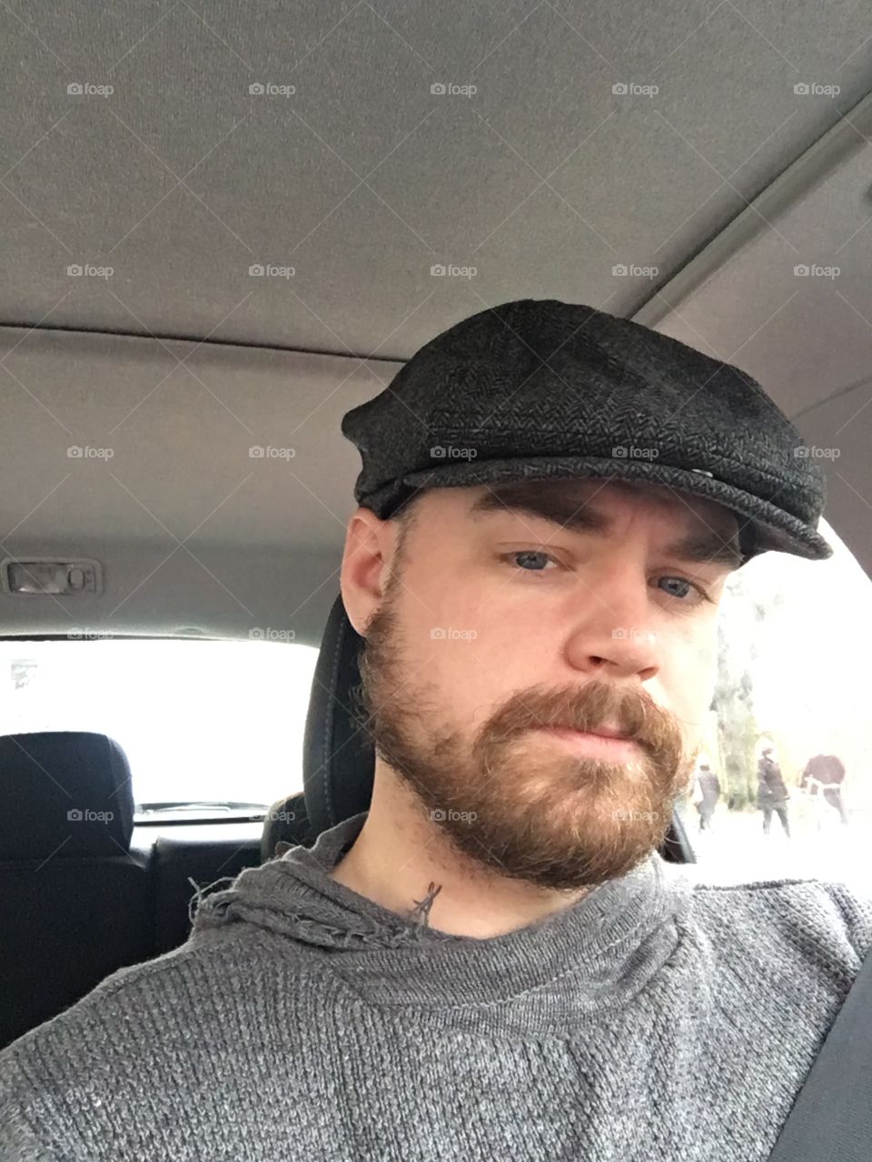 Got a new cap. Never wore one before. Goes well with the new beard! 