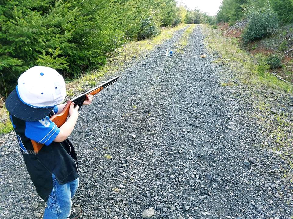 A boy and his bb gun.