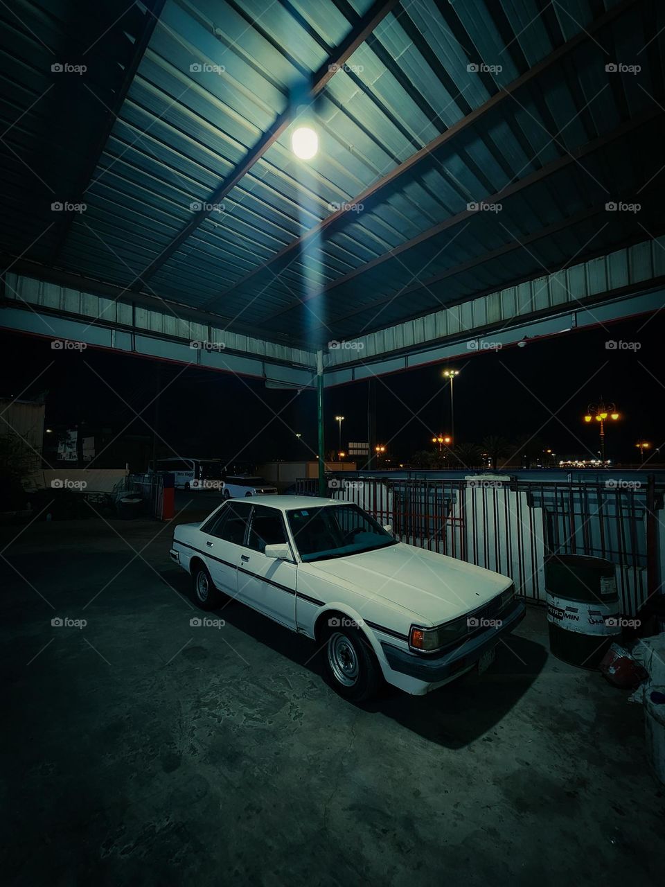 vintage car,workshop,streetlights.