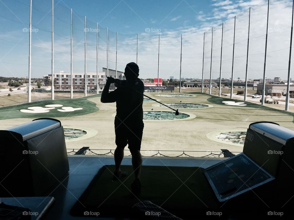 Swinging a golf club