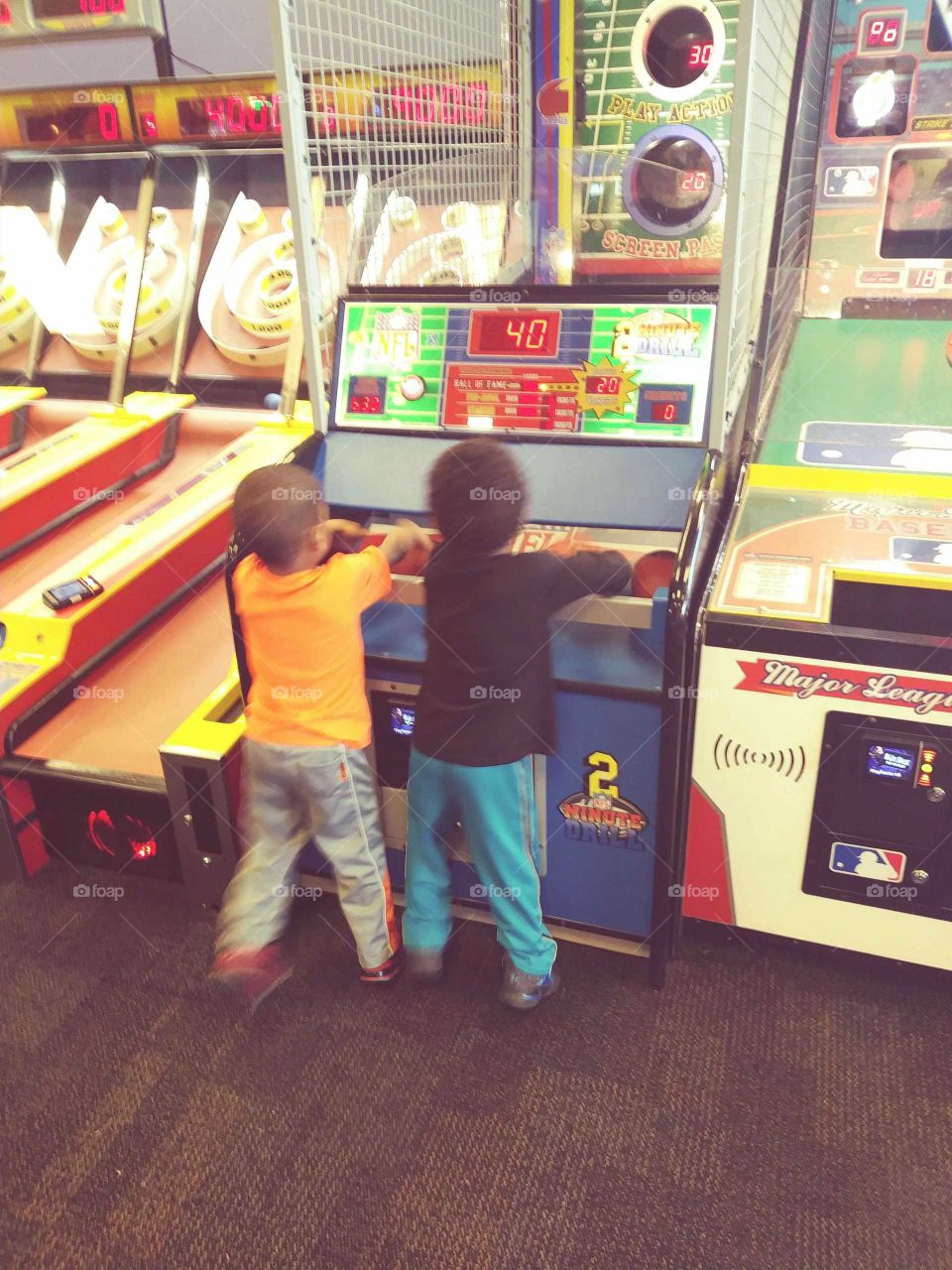 toodler playing arcade games
