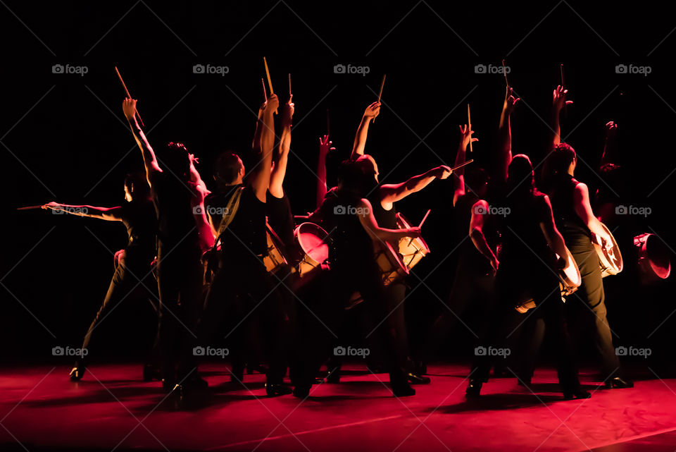 Drummers and dancers from Argentina perform on stage 