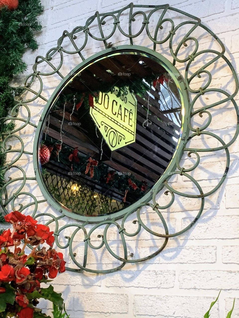 Reflection in the mirror of the nameplate