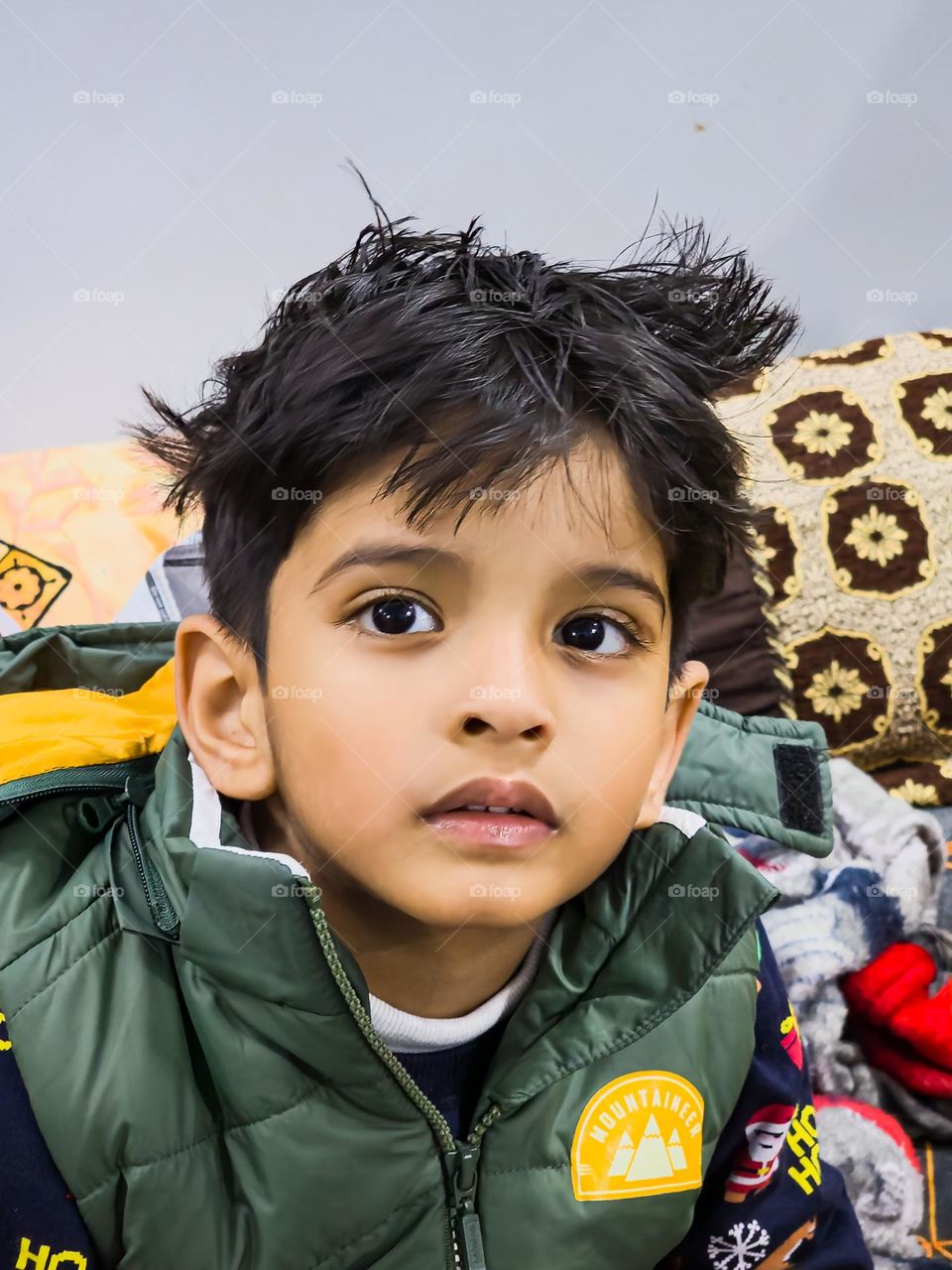 Cute little kid with it's messy hair