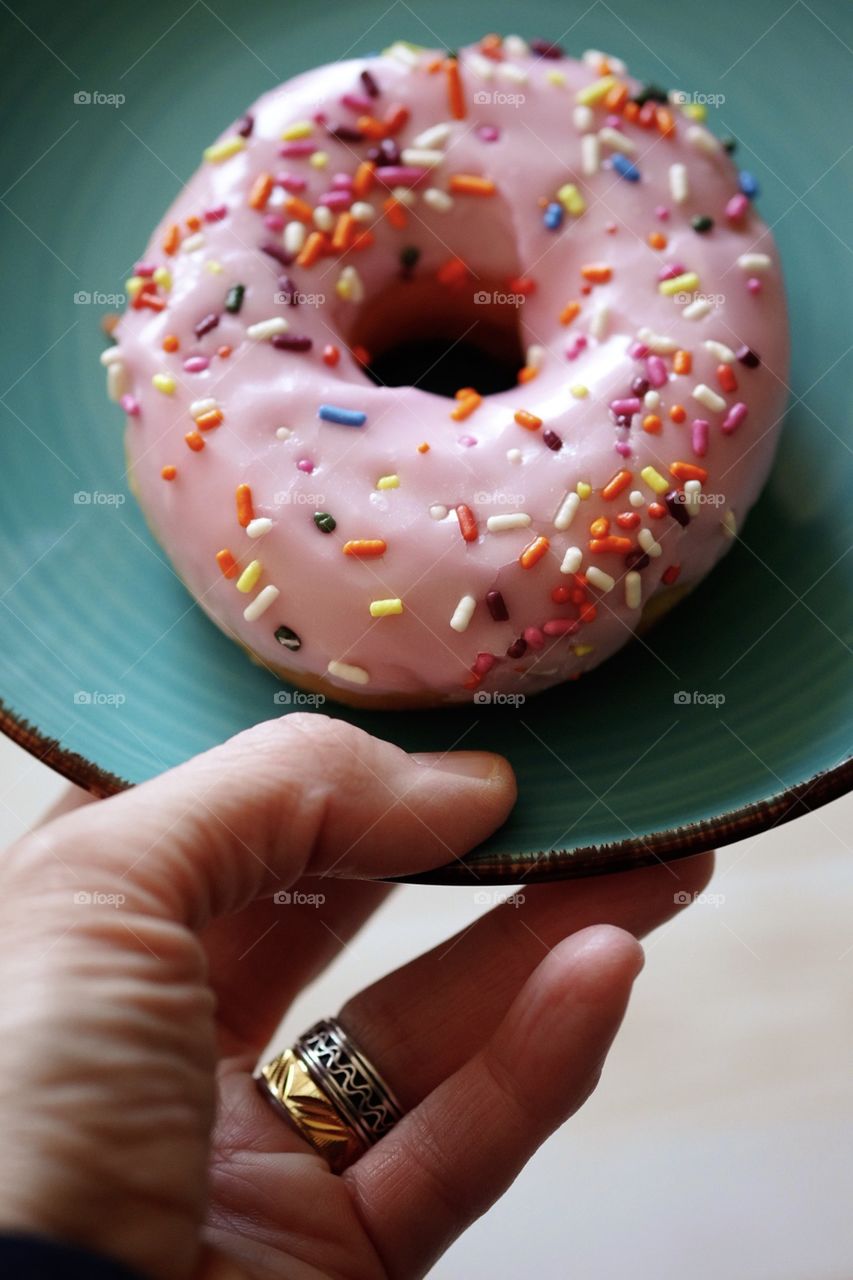 Holding A Plate With A Pink Frosted Donut With Colorful Sprinkles, Serving A Donut, Breakfast Foods, Food Photography 