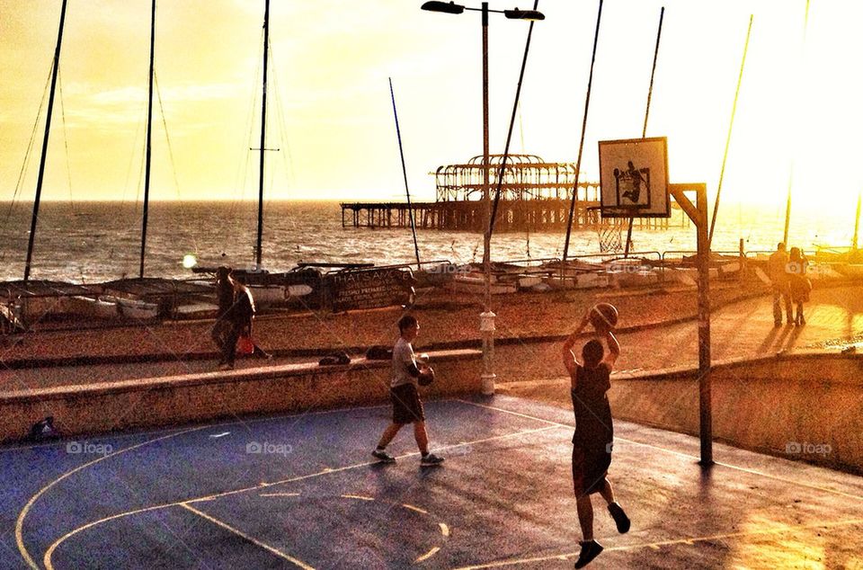 Basket ball at sunset