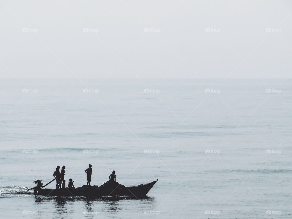People on boat at sea
