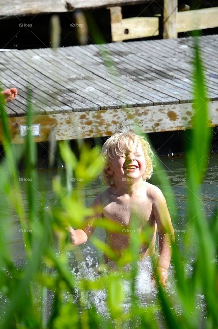 Boy in the reed