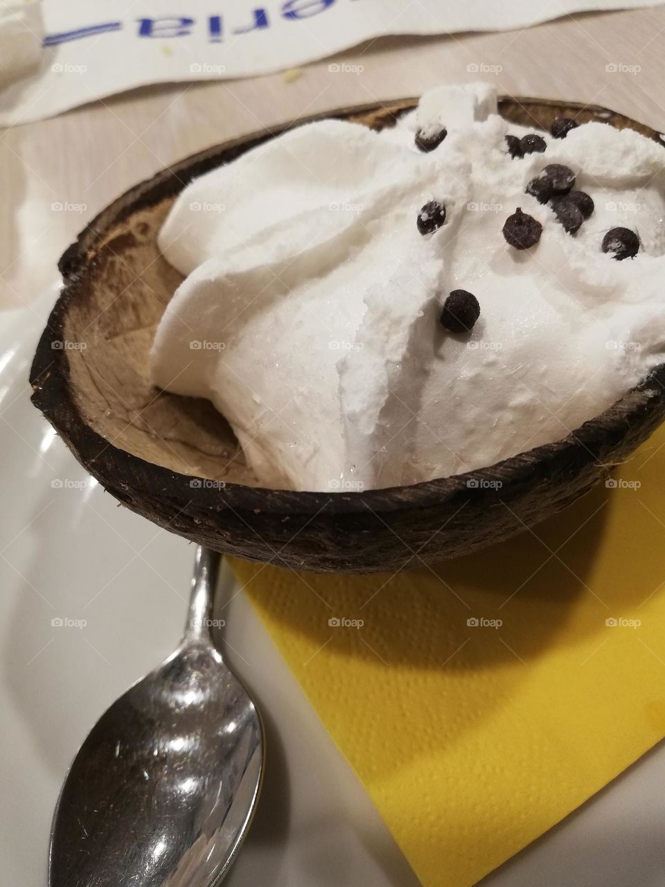 coconut cream in a coconut shell