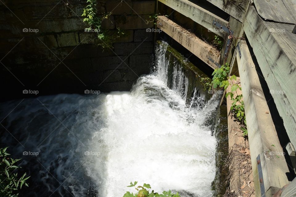 Water pouring through the lock