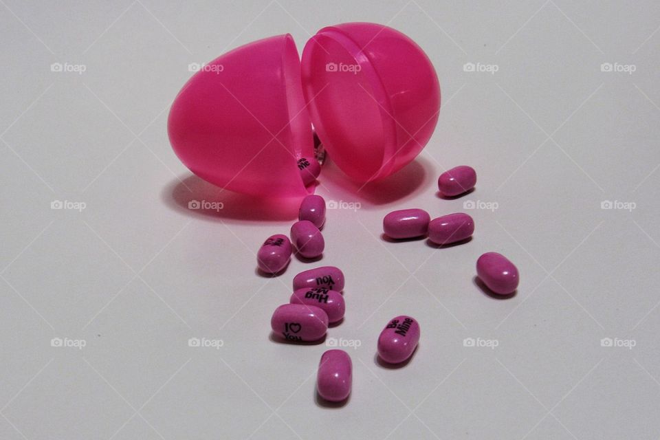 Pink tic tacs falling out egg