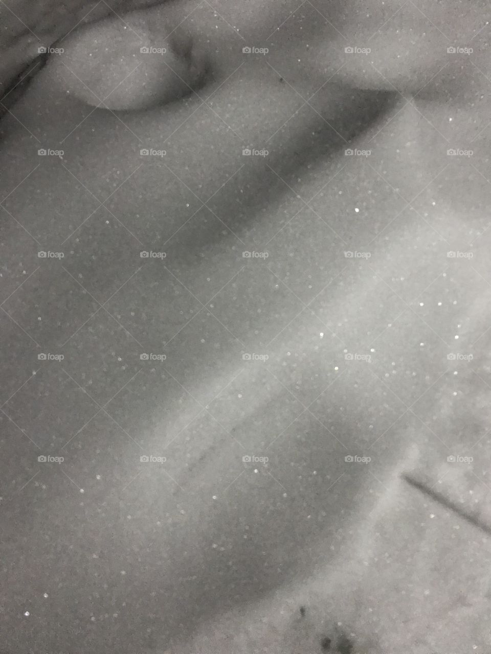 Footsteps in the winter snow. It was a cold evening out in the snow this picture was taken.