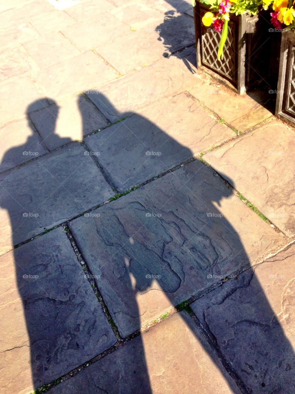 A photo of my lady and I on our way to hike up the Glastonbury Tor, in Glastonbury England. 