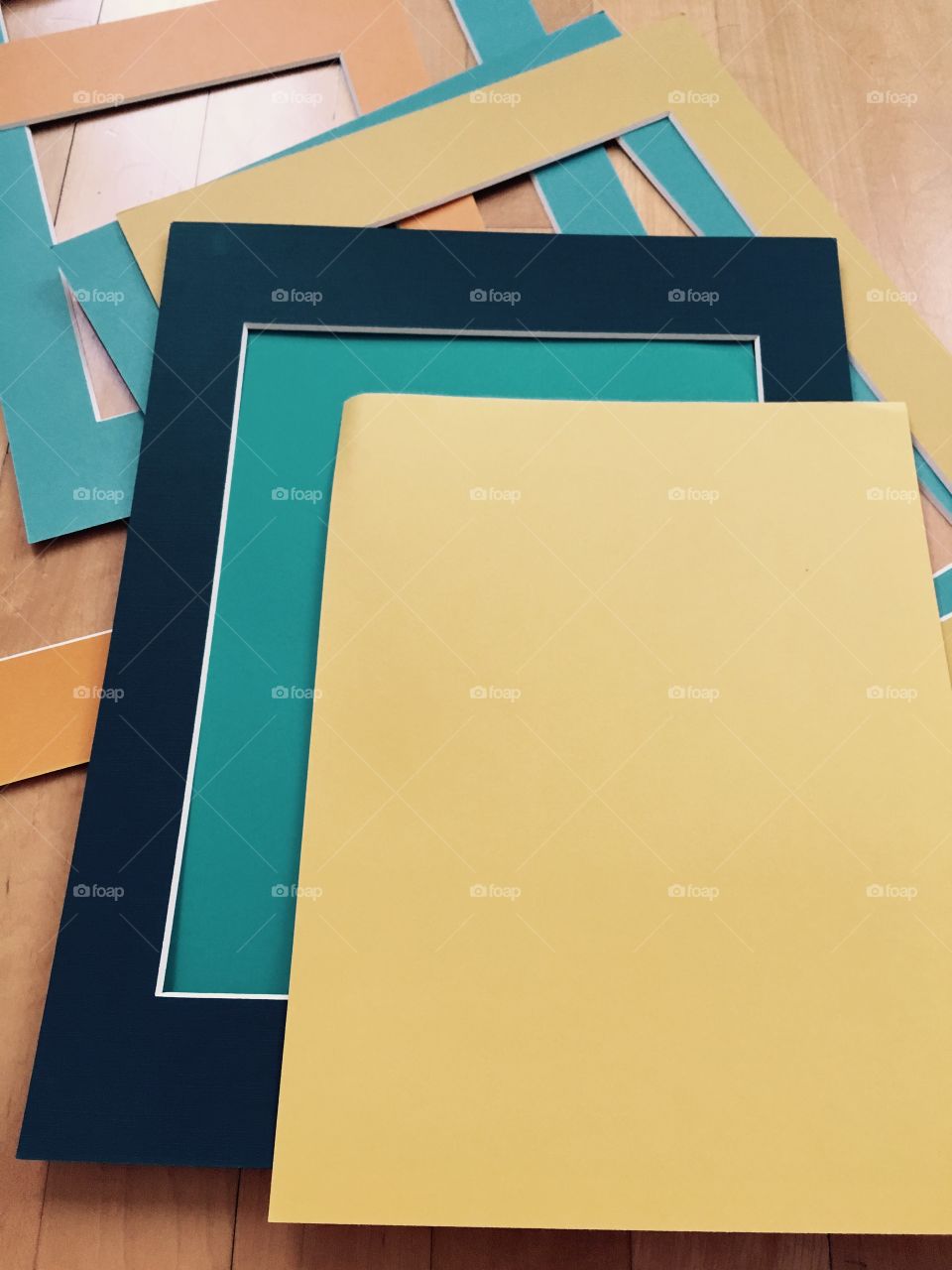 Preparing to craft with colored paper and frame