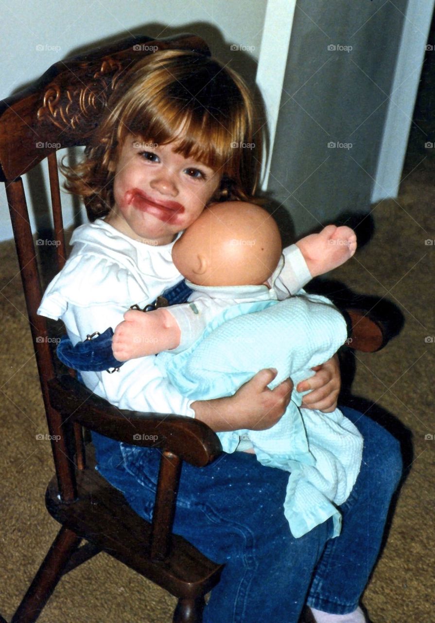 Girl and her doll 