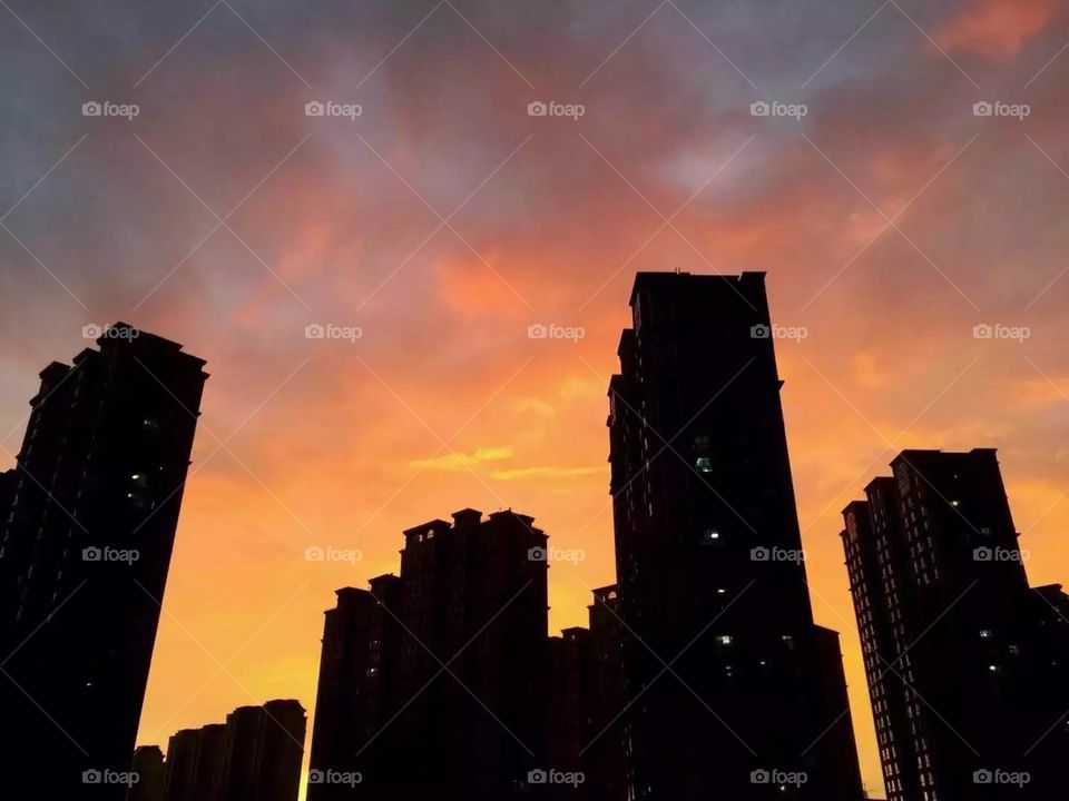 Buildings in sunset