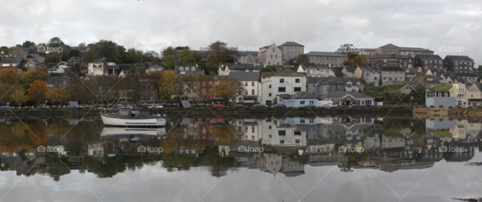 Mirror reflection county cork. Mirror seaside reflection across the town of Kerry in County Cork Ireland