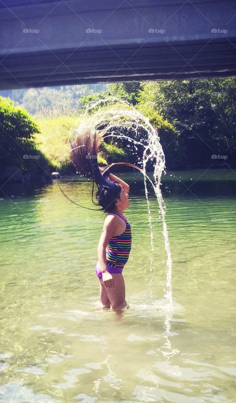 summer time at the river whipping the hair