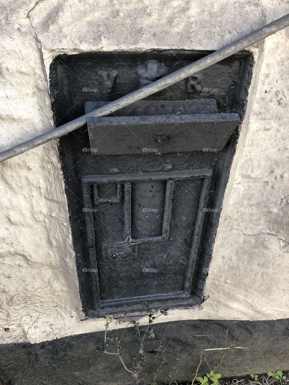 An abandoned and discarded post box, shut down and unloved and deemed obsolete.